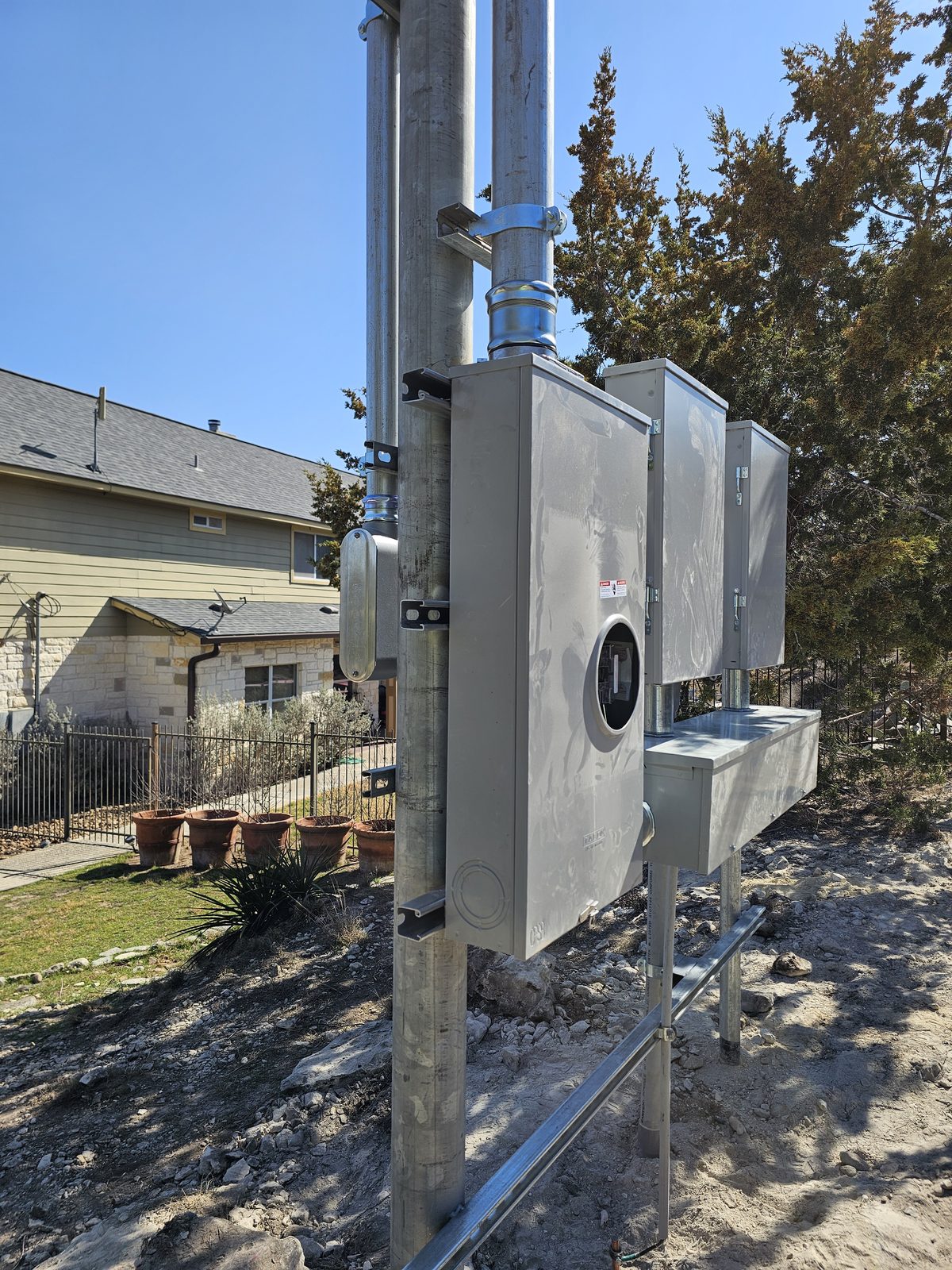 Finished multi-meter bank on a residential service pole