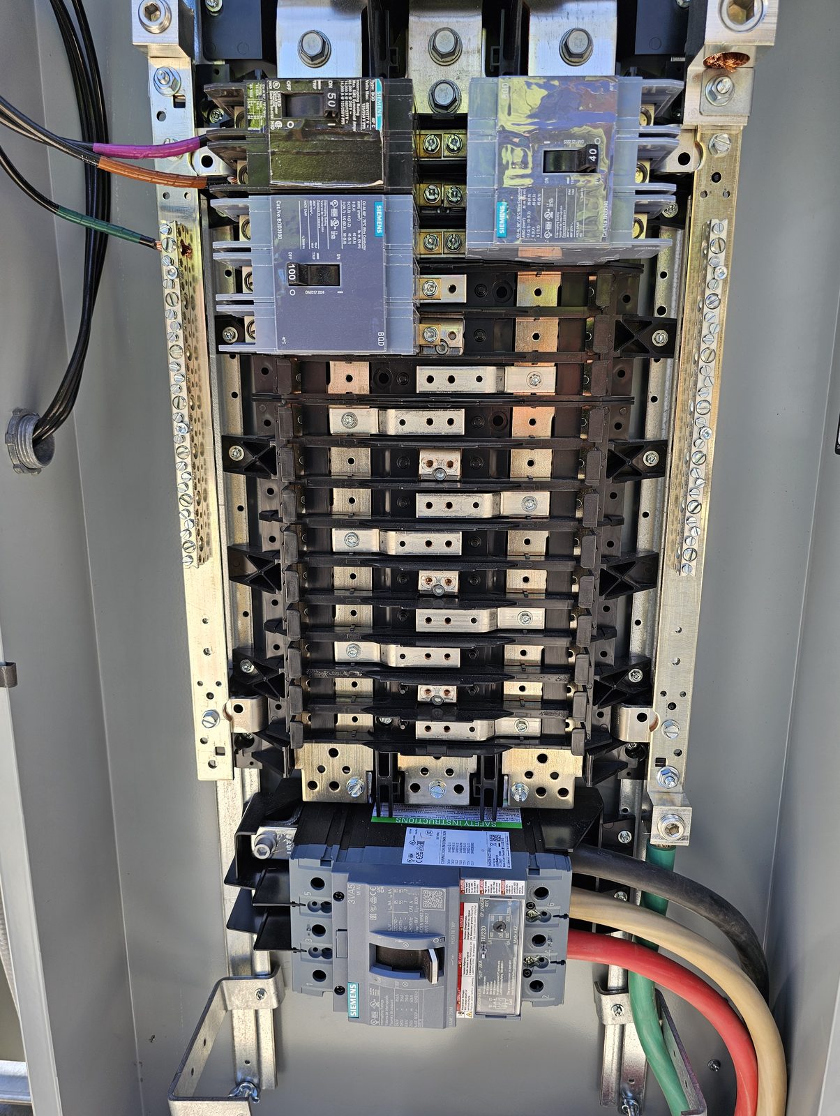 Interior of a Siemens bus in a shop-built 400 amp temporary panel